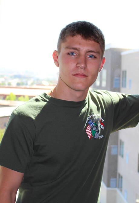 Superstud Dante undressing and showing tight butt outside