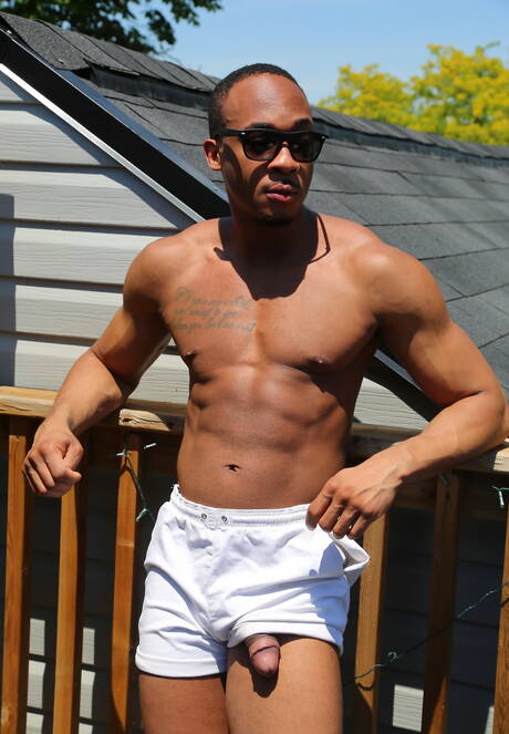 Black tough guy Trent King and canadian hunk Beau Reed in black on white sex outside