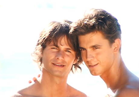 Muscular Marc Vidal and stud Rick Fontana have anal sex on beach