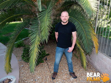 Bear Mitch Harrison undressing outside