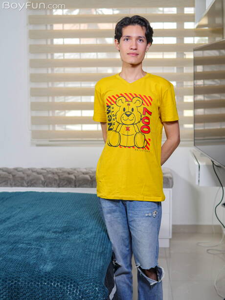 Latino pretty boy Danny Collins undressing and showing tight ass